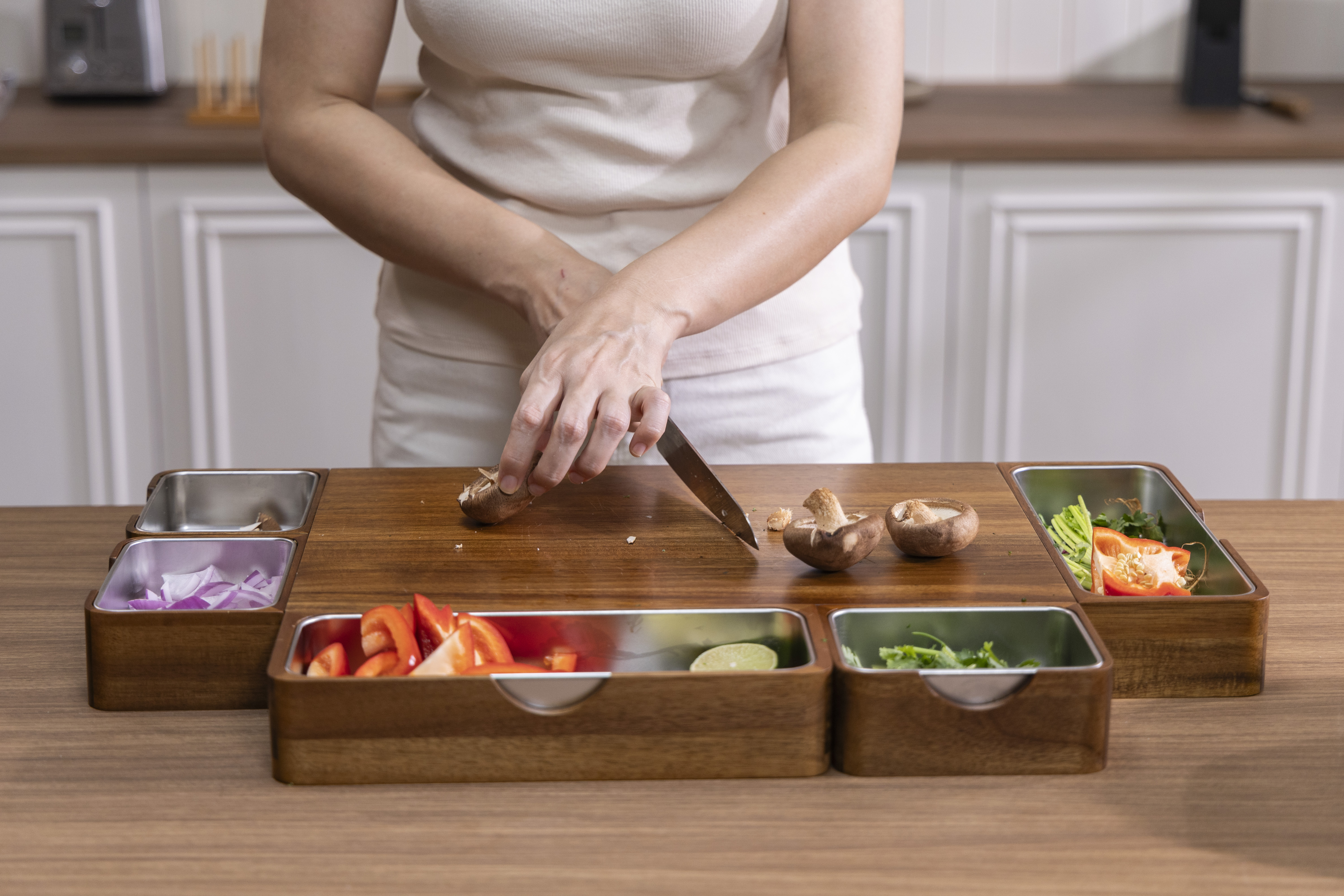 PrepTop workstation keeping ingredients and containers organized around one central board