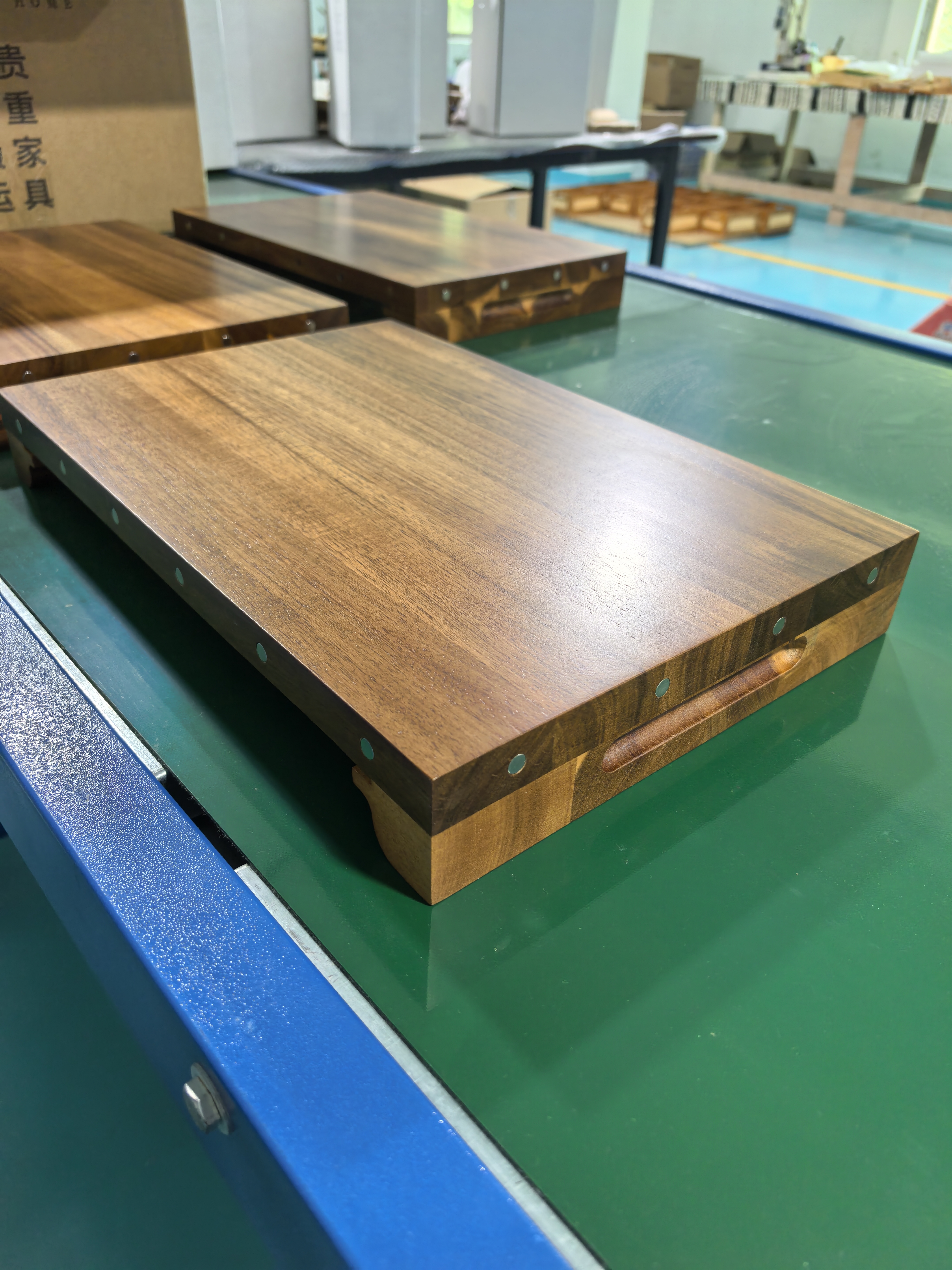 Finished PrepTop board sample on a green workbench
