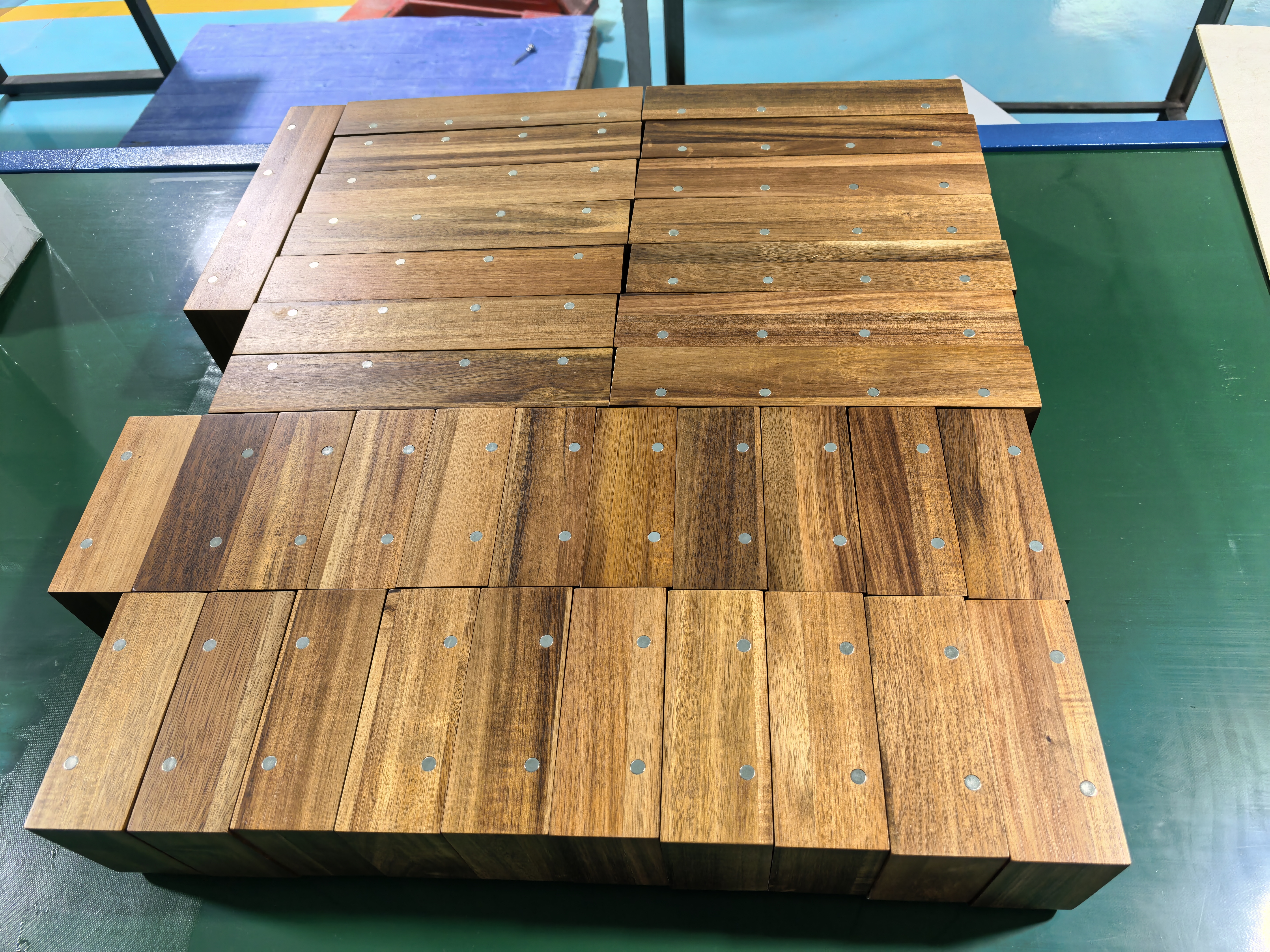 Wooden module samples laid out with visible magnetic connection points
